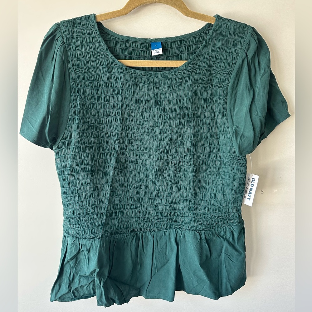 Of Navy blouse, new with tags.